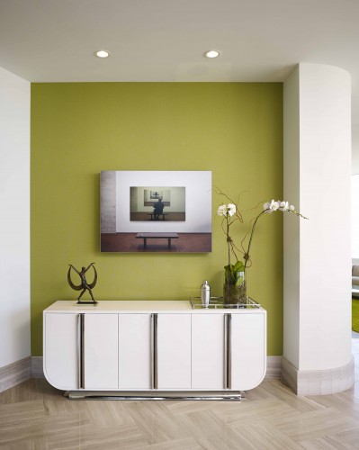 white furniture and painting with green backdrop